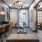 a room with a desk and chairs